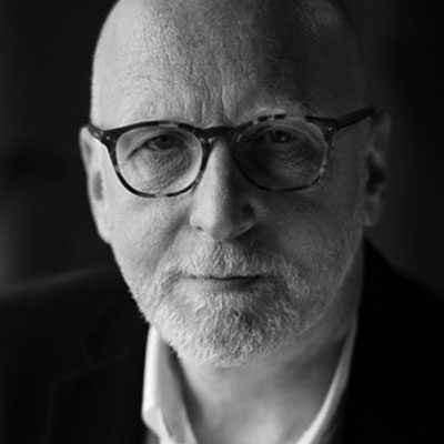 Black and white headshot of Brindley Sherratt