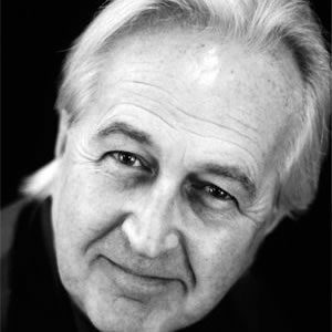 A man with white hair.
