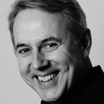 Black and white headshot of Richard Farnes